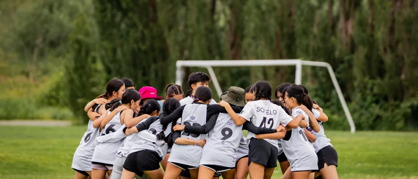 A group of players in a huddle